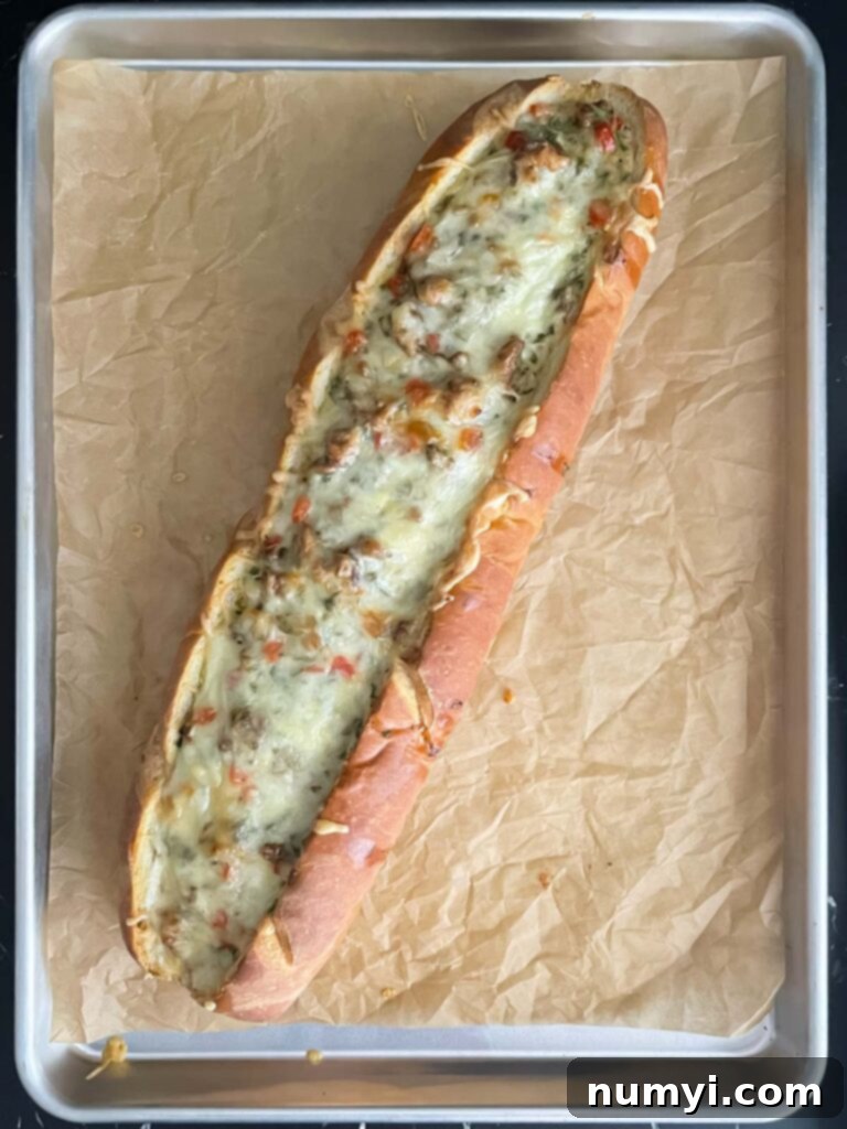 Loaded Sausage and Egg Baguette 14 Sausage and Egg Baguette Bake fresh out of the oven, golden brown and cheesy.