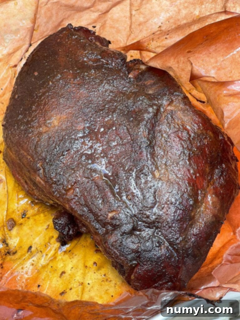 Smoky Pork Nacho Mountain 4 Smoked pork butt on butcher's paper.