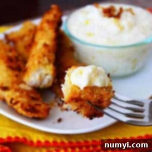 Crispy Baked Coconut Chicken Strips with Pineapple Dipping Sauce