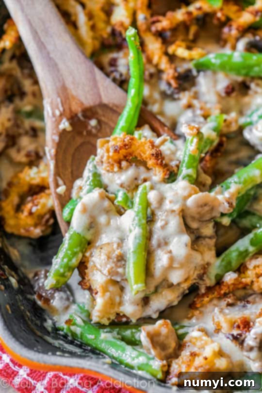 Homemade Creamy Green Bean Casserole from Scratch, a rich and savory Thanksgiving classic made with fresh ingredients, topped with crispy fried onions.