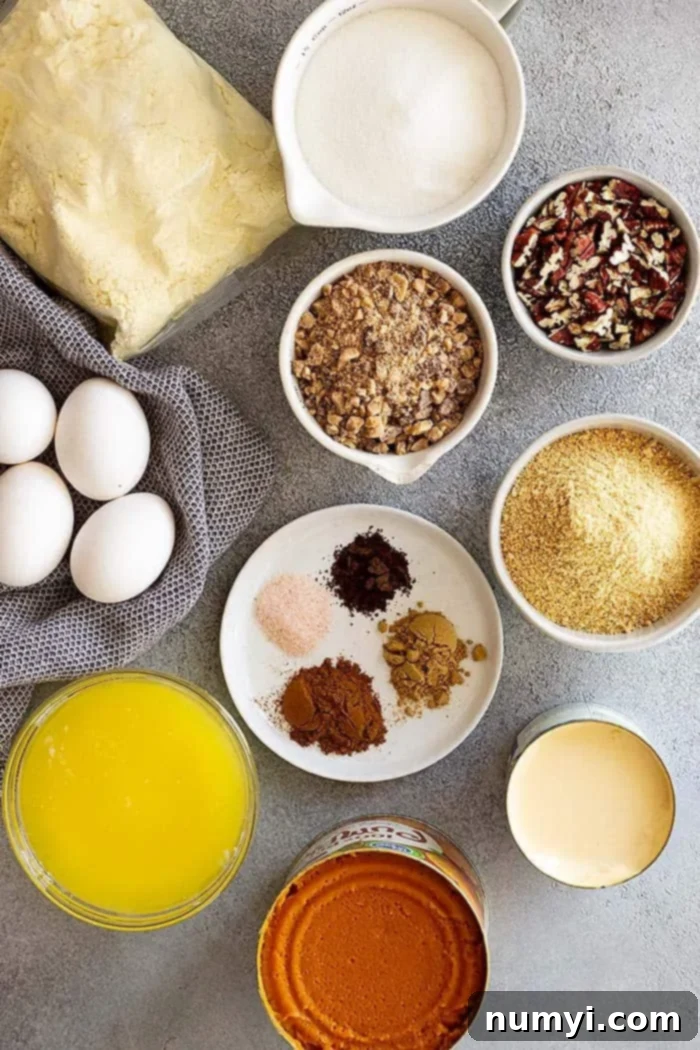 Simple Pumpkin Perfection 3 Overhead shot showcasing all the key ingredients neatly arranged on a counter, ready to be combined for this easy pumpkin dump cake recipe.