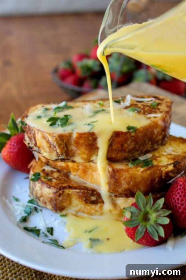 Gourmet Savory Parmesan French Toast with creamy Hollandaise Sauce, an elegant Christmas breakfast.