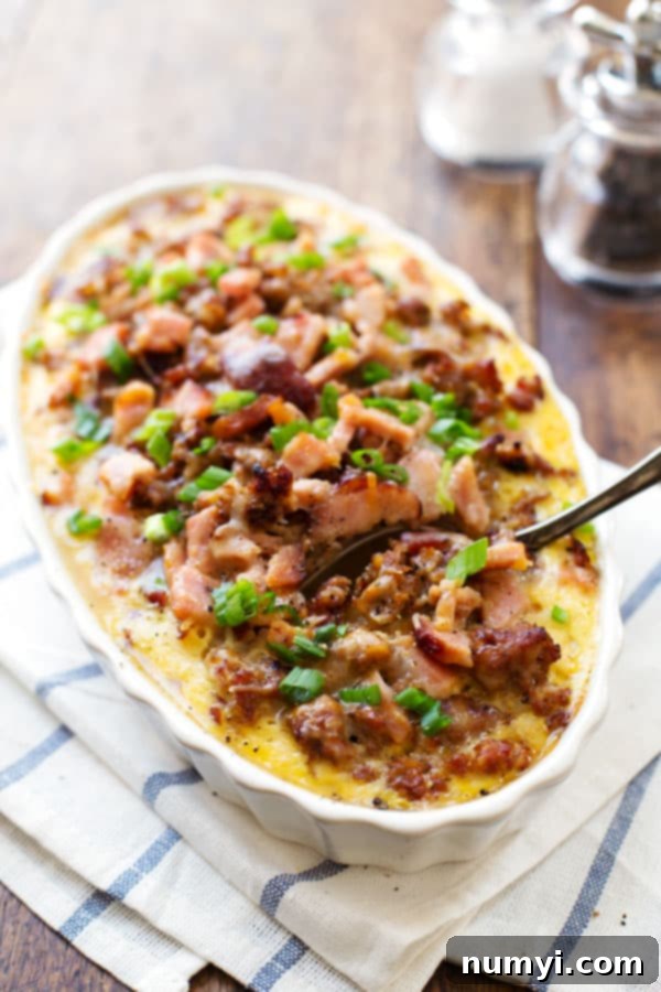 Savory Ham and Sausage Hash Brown Egg Bake, a satisfying Christmas morning casserole.