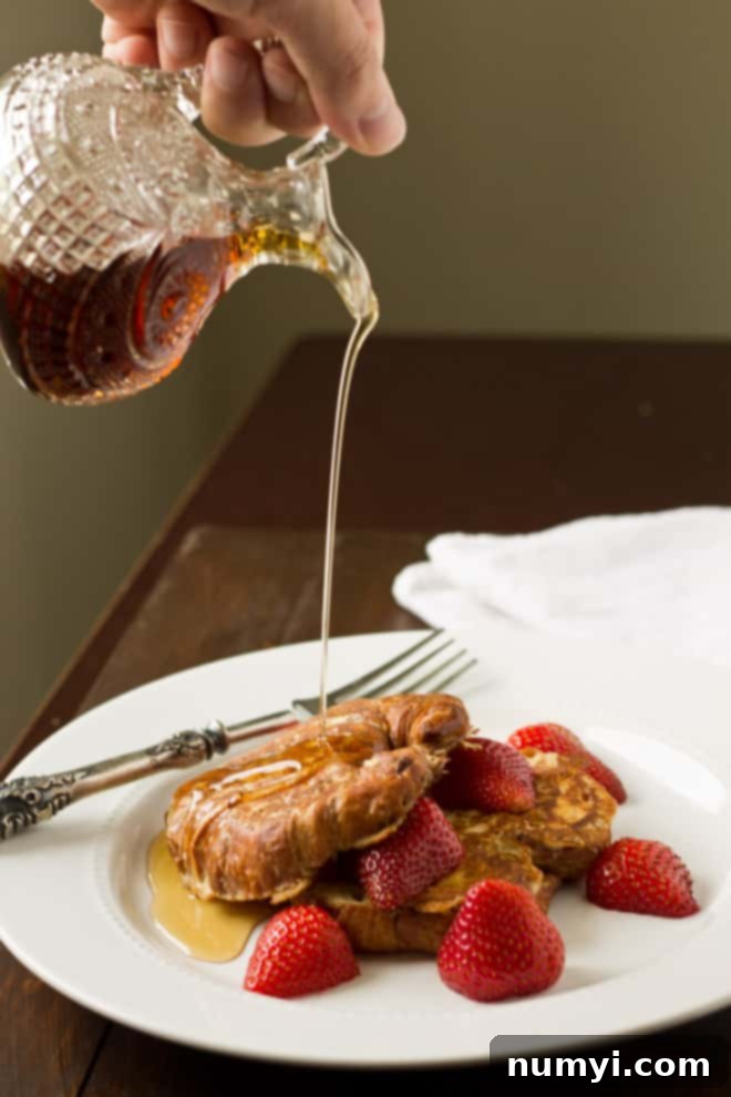 Indulgent Croissant French Toast, a gourmet twist on a beloved breakfast dish.