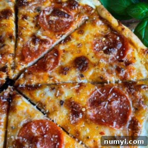 Homemade pepperoni pizza using homemade pizza dough.
