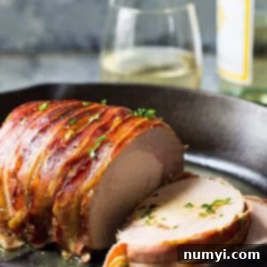 Crisp Bacon-Wrapped Pork Loin 6 This Bacon Wrapped Pork Loin is easy enough for a weeknight meal but impressive enough to serve to special guests!