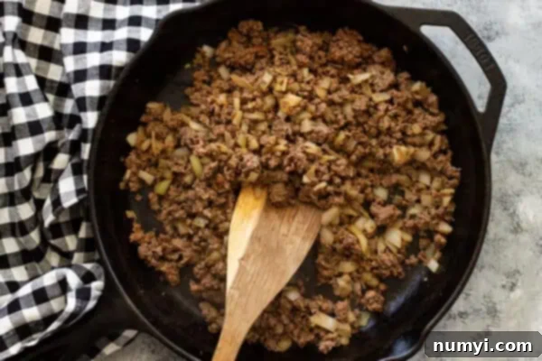 Overhead view of browned ground beef.