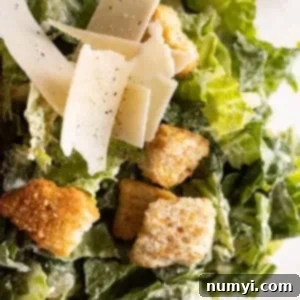 Close up of Easy Caesar Salad with croutons and parmesan.