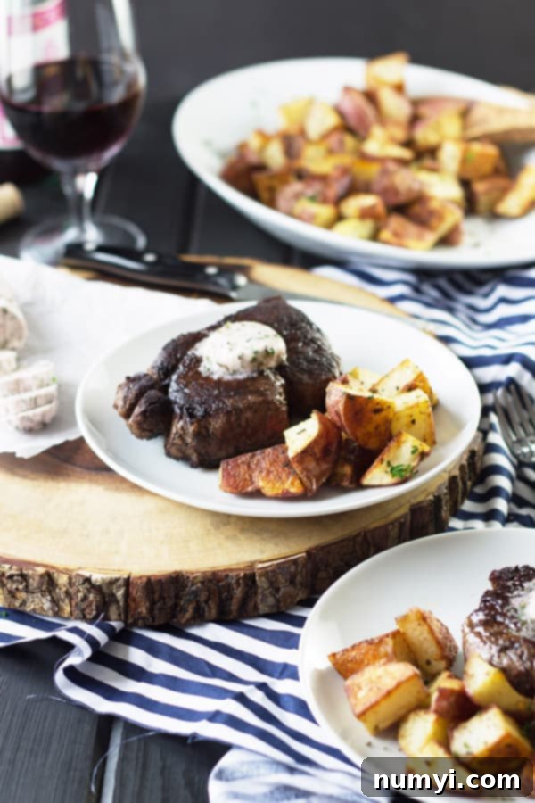 Plates featuring exquisite steak with melting compound butter, artfully arranged with roasted potatoes and a glass of fine red wine, ready for a gourmet dining experience.