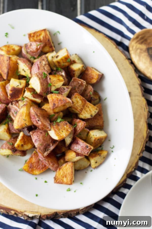 Aerial shot of a pan filled with beautifully crispy roasted potatoes