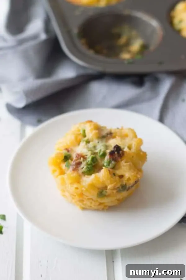 overhead: baked macaroni and cheese cup on a circular white plate