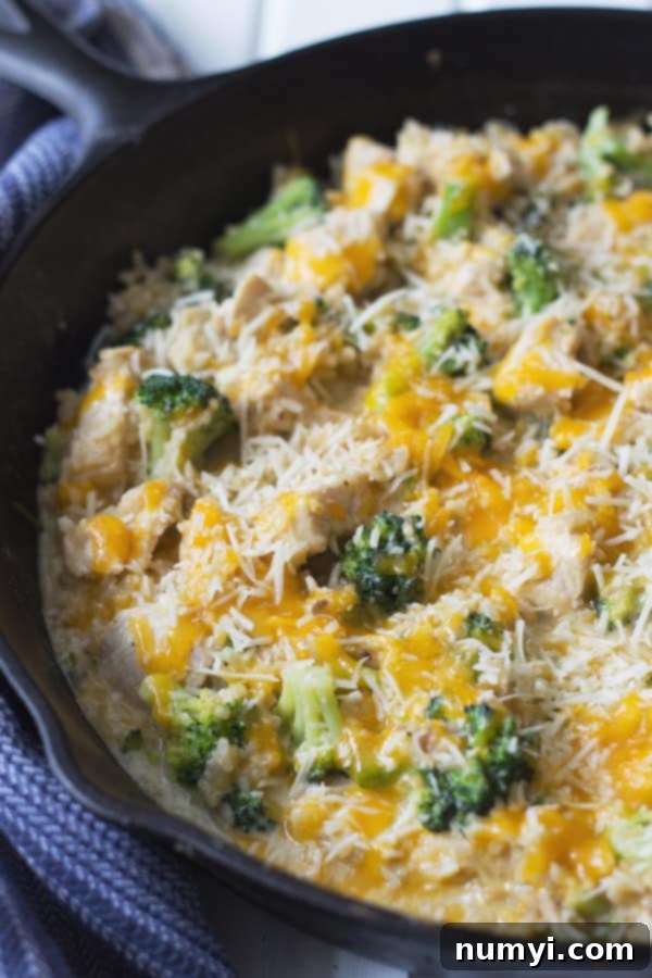 One Pot Chicken Broccoli and Rice -this easy 30 minute recipe is comfort food made fast! Tender chicken, broccoli cooked just right, fluffy rice and lots of melty cheese! | www.countrysidecravings.com