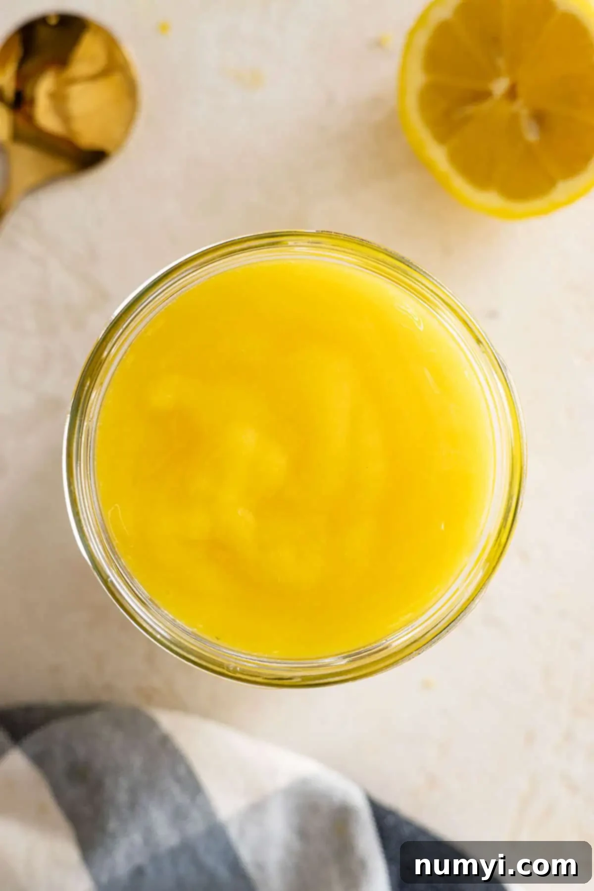 Overhead view of the completed curd in a jar. 