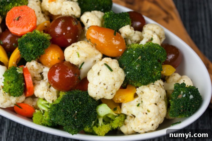 Vibrant Marinated Garden Medley 2 Healthy Marinated Fresh Vegetable Salad in a white serving bowl.