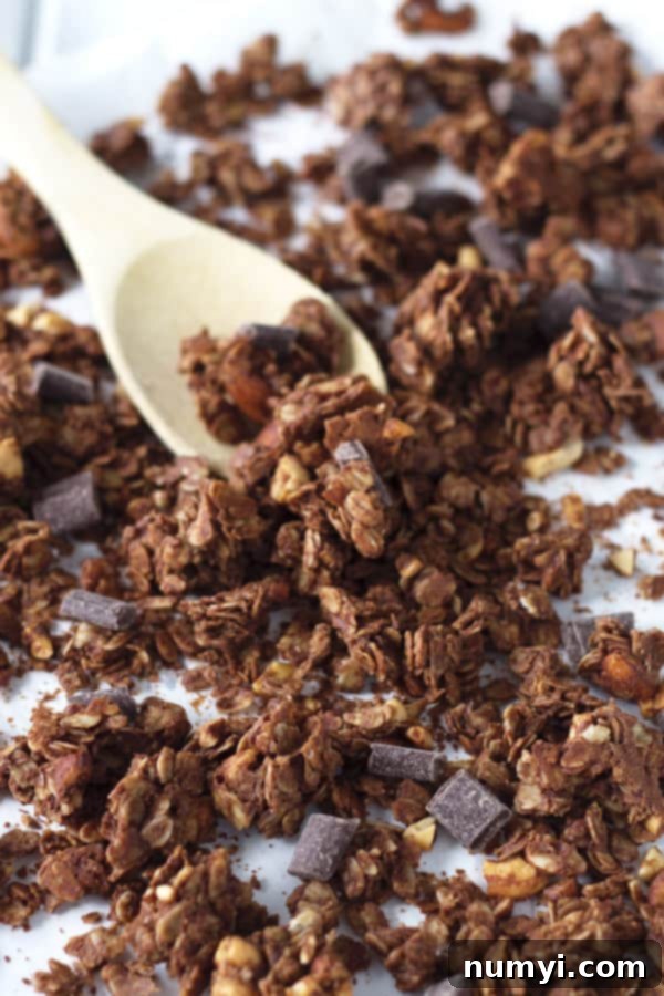 Freshly baked Chocolate Peanut Butter Granola with large, prominent clusters ready for snacking