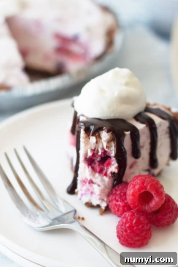 easy to make frozen triple berry cheesecake full of fruity and creamy flavors