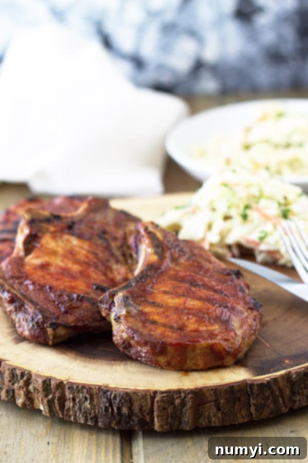 Effortless Smoked BBQ Pork Chops 4 Preparing the foil packet for wood chips, essential for quick smoking on a gas grill.
