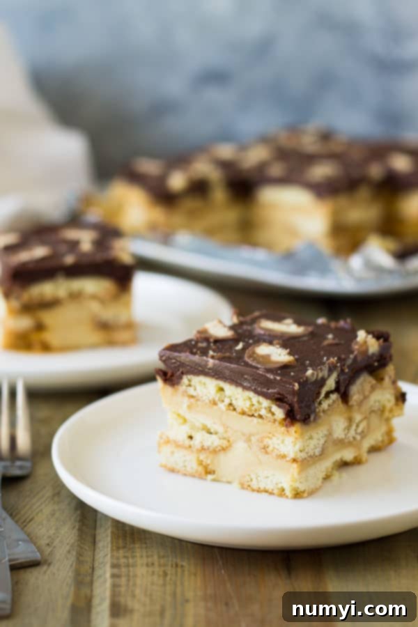This Twix Icebox Cake is an easy and decadent no-bake cake. Made with homemade pudding, shortbread cookies, caramel and chocolate! | www.countrysidecravings.com