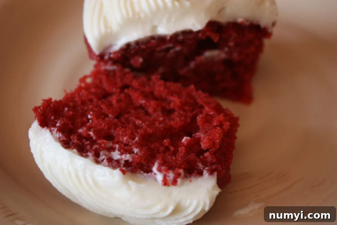 A batch of homemade Red Velvet Cupcakes with Cream Cheese Frosting