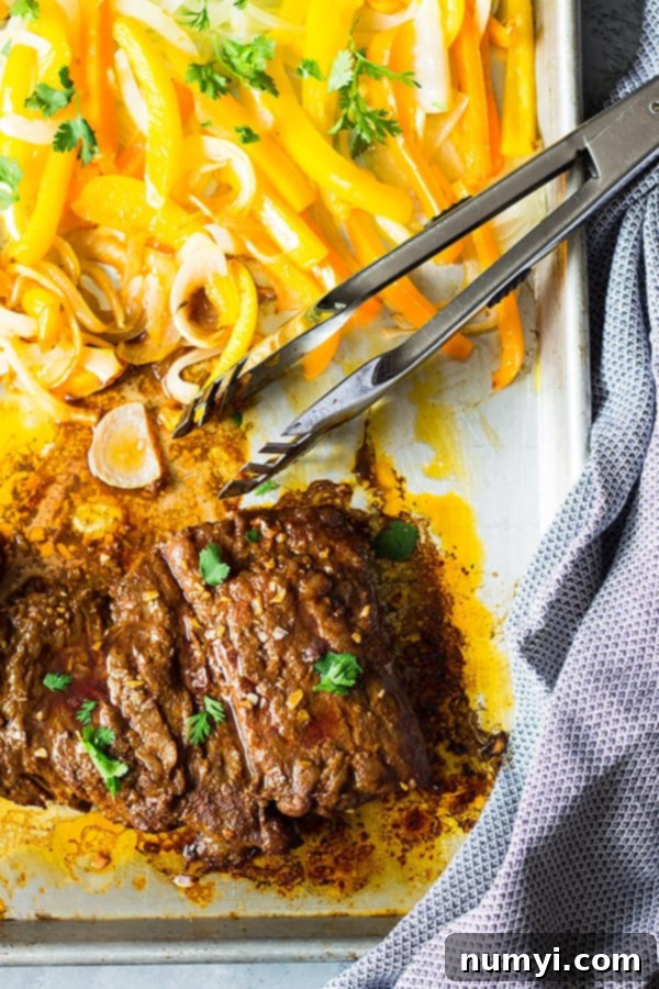 Easy Sheet Pan Steak Fajitas are super easy, flavorful and sure to become a favorite!! | www.countrysidecravings.com