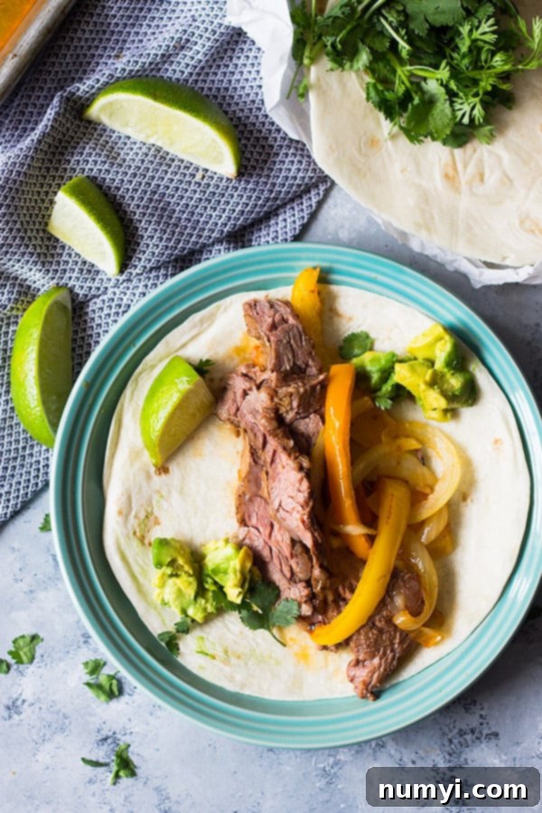 Easy Sheet Pan Steak Fajitas are super easy, flavorful and sure to become a favorite!! | www.countrysidecravings.com
