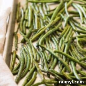 Crispy oven roasted green beans on a platter.