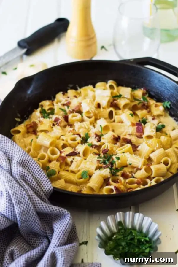 Creamy One-Pan Bacon Alfredo 4 alfredo bacon pasta in a large skillet with fresh herbs