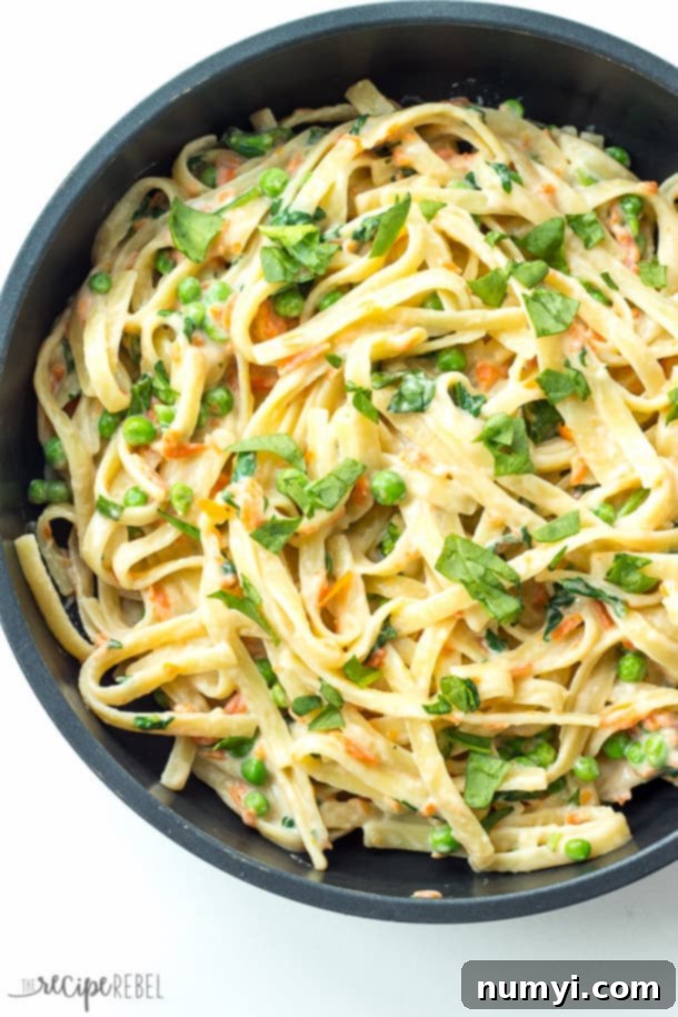 One Pot Pasta Primavera: a fresh and vibrant pasta dish packed with colorful vegetables, cooked in a single pot.
