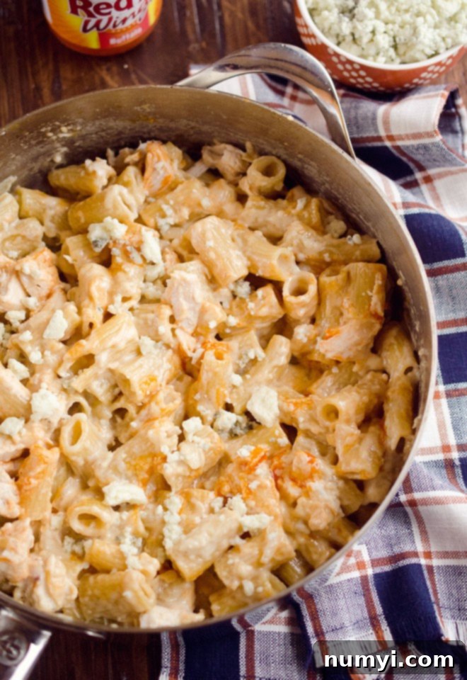 One Pot Creamy Buffalo Chicken Pasta: a bold and flavorful pasta dish combining creamy sauce with spicy buffalo chicken, all in one pot.