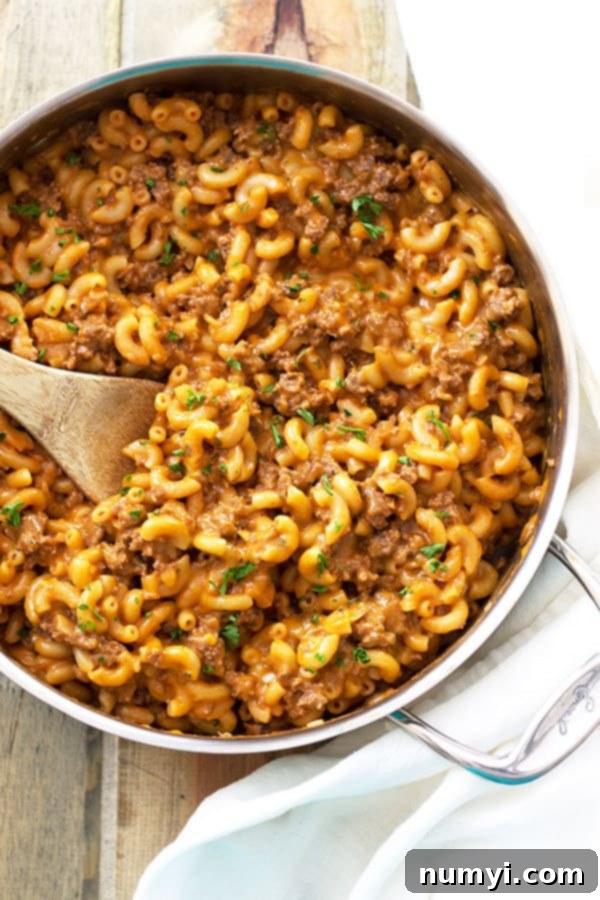 Homemade One Pot Hamburger Helper: a family-favorite pasta dish with ground beef and a cheesy sauce, a superior alternative to the boxed version.