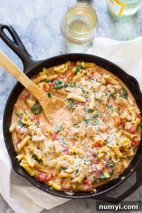 One Pot Chicken Florentine Pasta: a creamy, saucy 30-minute meal with tender chicken and spinach, a family favorite.