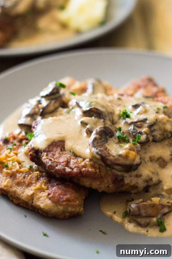 This easy Pork Marsala is full of flavor from the Marsala wine, mushrooms and garlic then made extra decadent from some half and half. | www.countrysidecravings.com