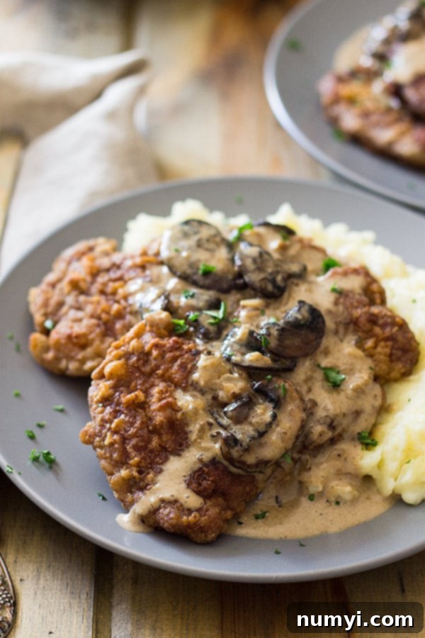 This easy Pork Marsala is full of flavor from the Marsala wine, mushrooms and garlic then made extra decadent from some half and half. | www.countrysidecravings.com