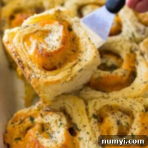 A top-down view of Ham and Cheddar Biscuit Rolls, fresh and ready to be enjoyed.