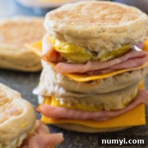 This Freezer Breakfast Ham Egg and Cheese sandwich is a healthier alternative to that Egg McMuffin! They are easy to make and are a great for breakfast on the go! | www.countrysidecravings.com