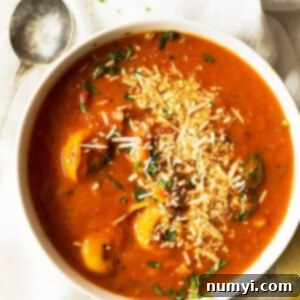 A smaller image of the creamy tomato tortellini soup, emphasizing the rich texture and inviting appearance of the dish.