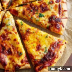 Perfectly Homemade Cheese Pizza 8 Top down of pizza slices.