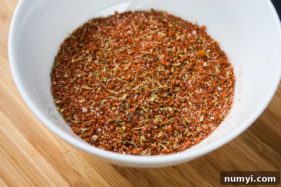 Cajun Smoked Wings - close-up of mixed spices in a small white bowl, ready for the rub.
