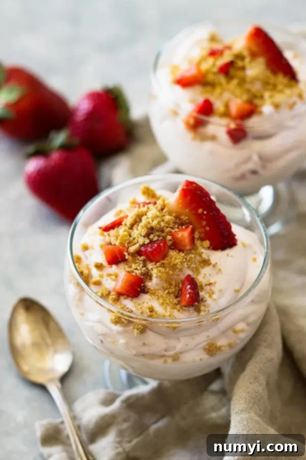 Two bowls of this strawberry cheesecake fluff recipe.
