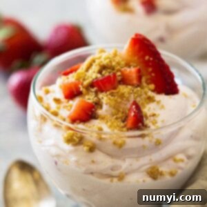 This Strawberry Cheesecake Fluff is a super simple and easy dessert to make. It's light and creamy, filled with strawberries and sprinkled with a graham cracker topping.