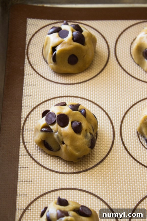 Dough balls on silicon mat.
