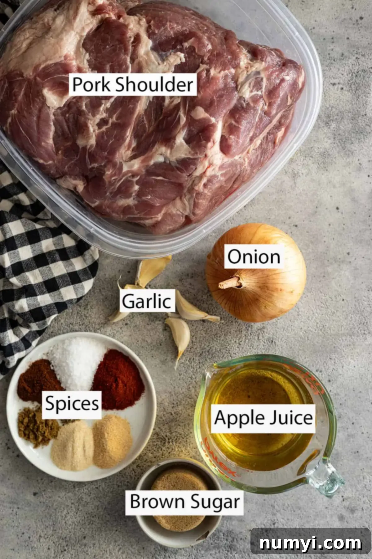 Ingredients: pork shoulder, onion, garlic, apple juice, brown sugar, and spices. 