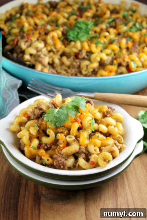 A hearty and cheesy Zesty Taco Pasta Bake in a baking dish, ready to serve.