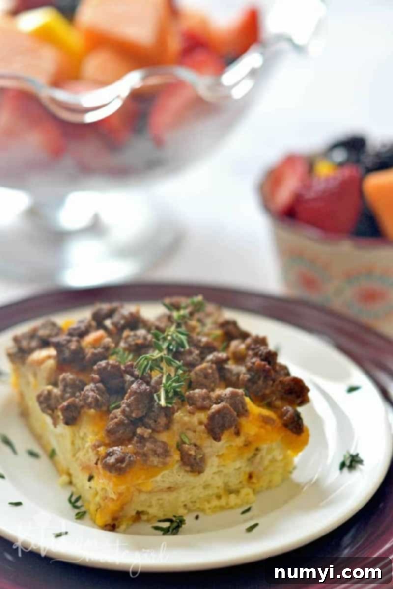 A savory Sunday Brunch Casserole, baked golden brown in a rectangular dish, ready to be served.