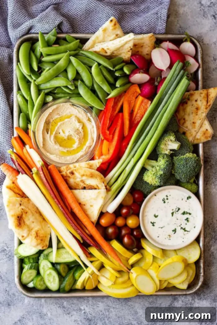 Overhead view of a beautiful vegetable tray complete with homemade ranch