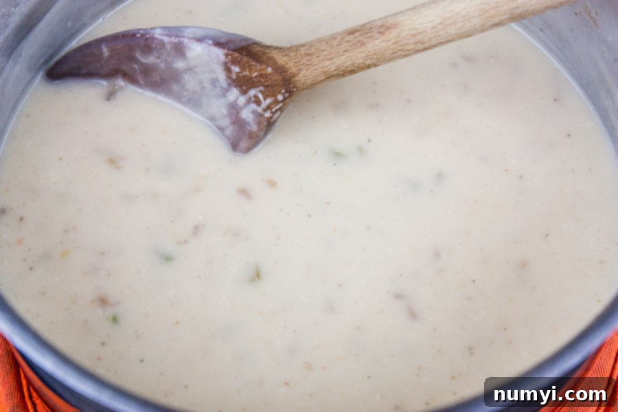 Cream base in a sauce pan for the turkey tetrazzini.
