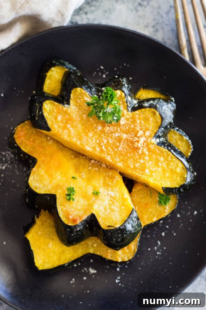 This simple Parmesan Roasted Acorn Squash is an easy side dish. It uses just a few simple ingredients and you can even roast the seeds!