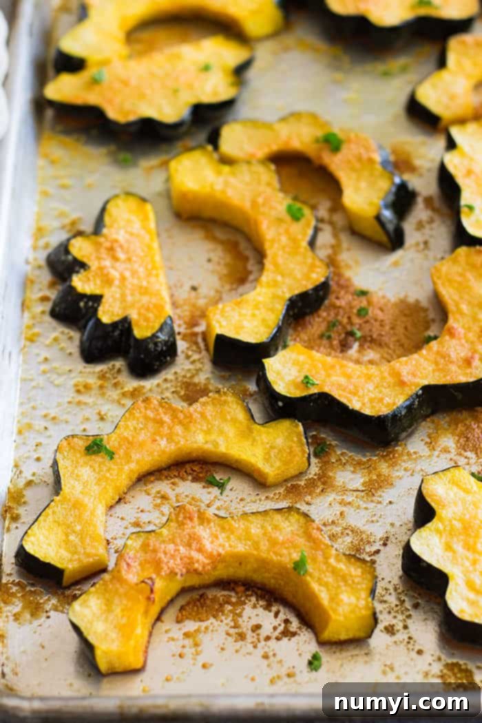 This simple Parmesan Roasted Acorn Squash is an easy side dish. It uses just a few simple ingredients and you can even roast the seeds!