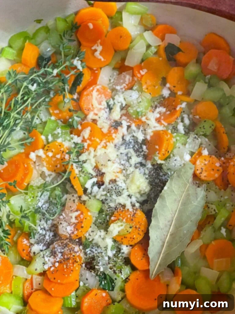 Turkish Noodle Soup 7 Adding herbs and spices to the sautéed vegetables.